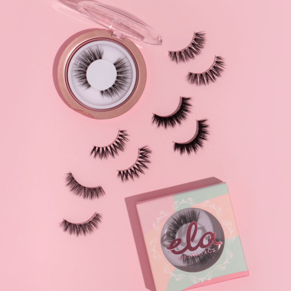 6 sets of false eyelashes on pink background