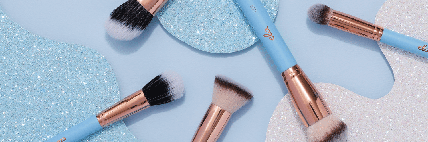 Close up photo of the perfect blend brush set, 5 brushes with a baby blue handle
