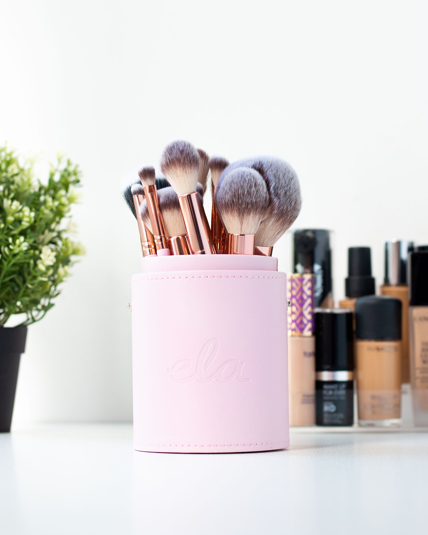 Photo of brushes from the Angel Falls Brush Set in the cup holder, sitting on a vanity