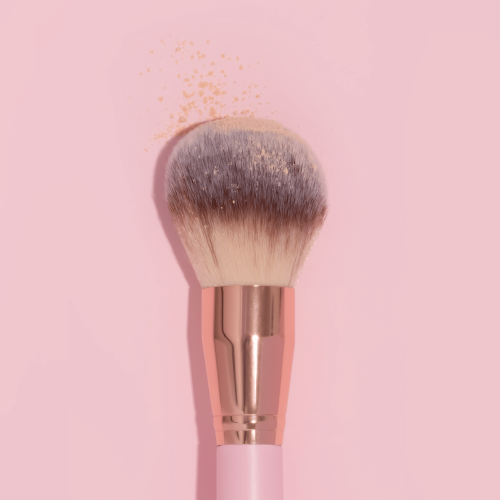 Luxe Powder Brush on pink background
