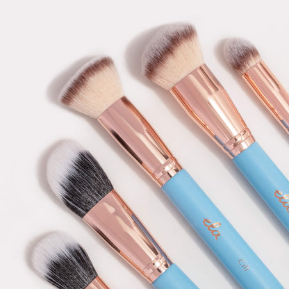 Close up of five baby blue brushes
