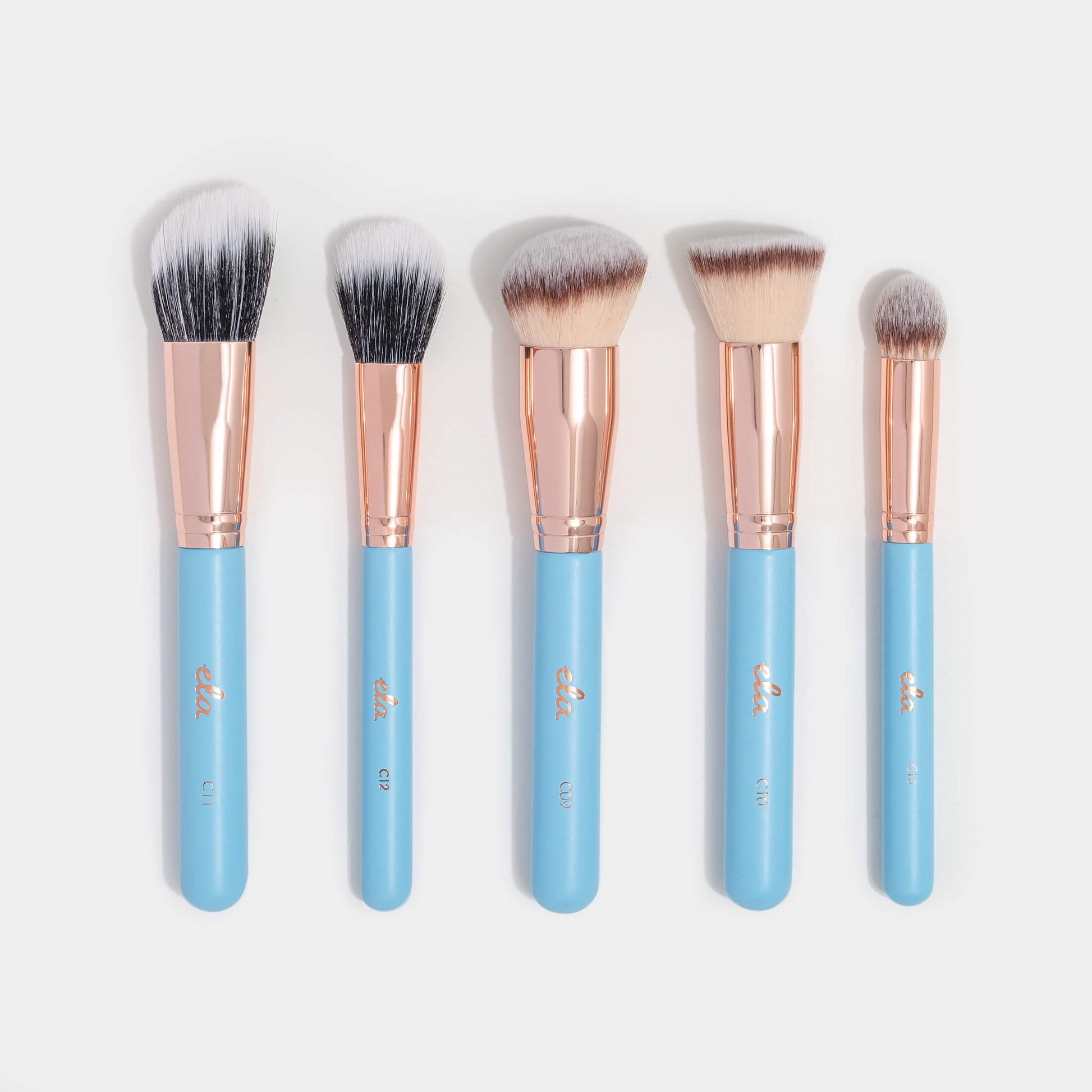 five baby blue brushes designed for liquids and creams
